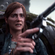 Ellie hides behind a rusted car that has moss growing over it as she brandishes her gun and grimaces as she hypes her self up for a fight.